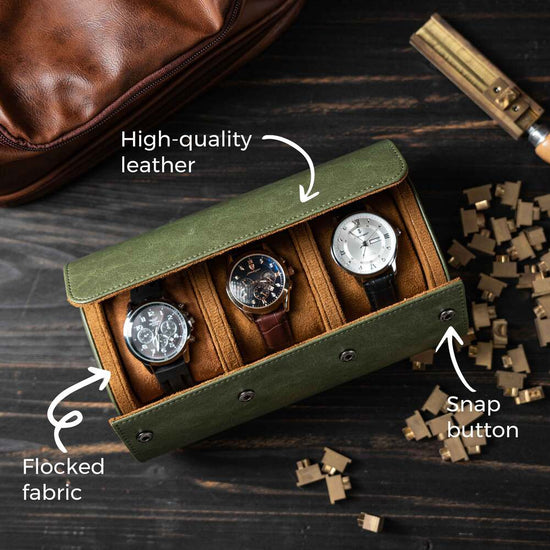 Green watch box with four watches on a wooden surface, highlighting features like high-quality leather and snap button.